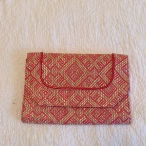 Pink woven envelope close clutch